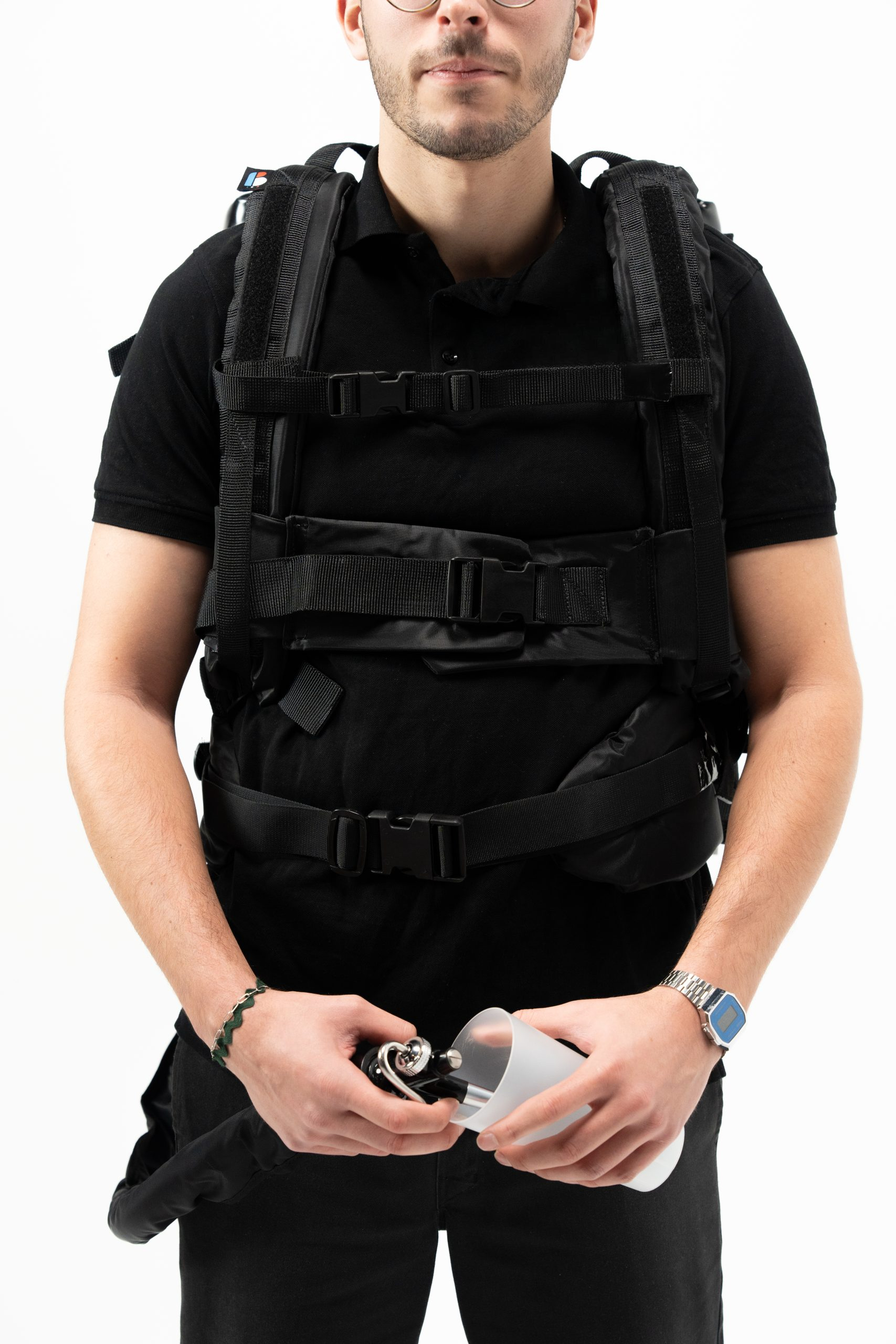 Server using the DraftGo backpack to pour cold soft drinks or draft beer.