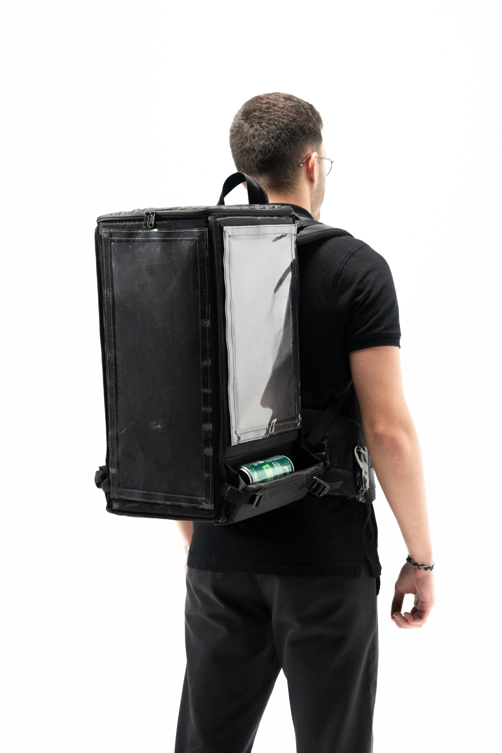 Back view of the Soft Bag backpack showing the side openings to grab a can.