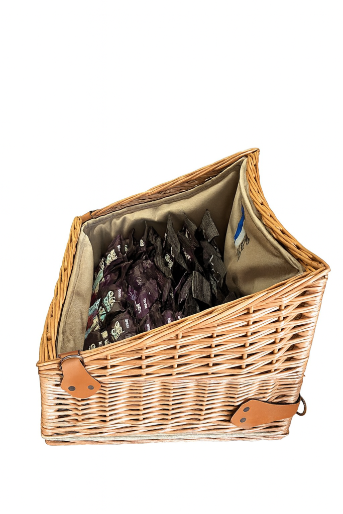 Side view of wicker hawker tray filled with snacks, designed for hands-free vending at festivals, cinemas, and theatres.