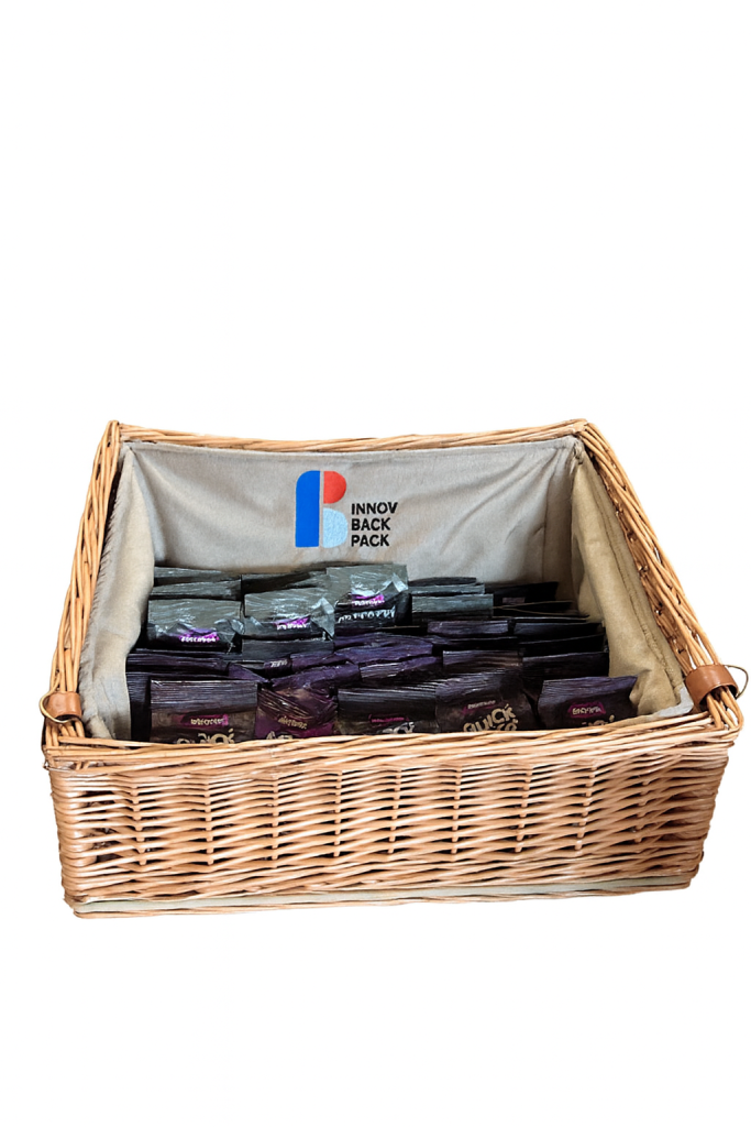 Professional wicker concession tray for hands-free vending at cinemas, theatres, and festivals, designed by Innov Back Pack.