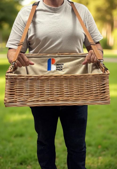 Professional wicker usherette tray with adjustable removable harness for hands-free event vending and brand promotion.